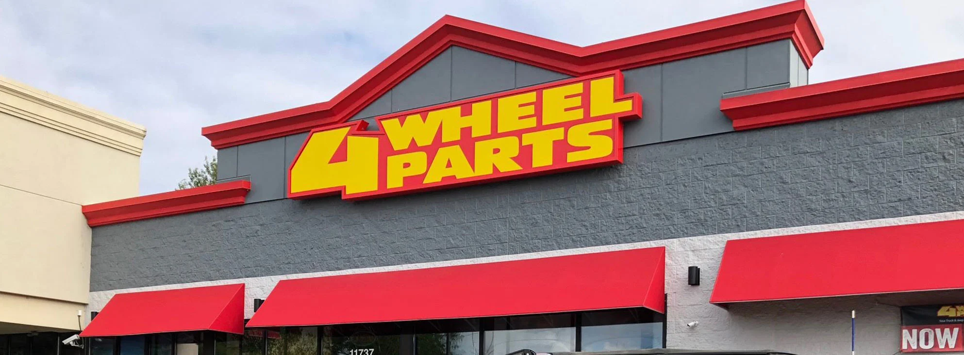 4 Wheel Parts branding by Dogs of Design – dynamic automotive logo design for aftermarket parts company