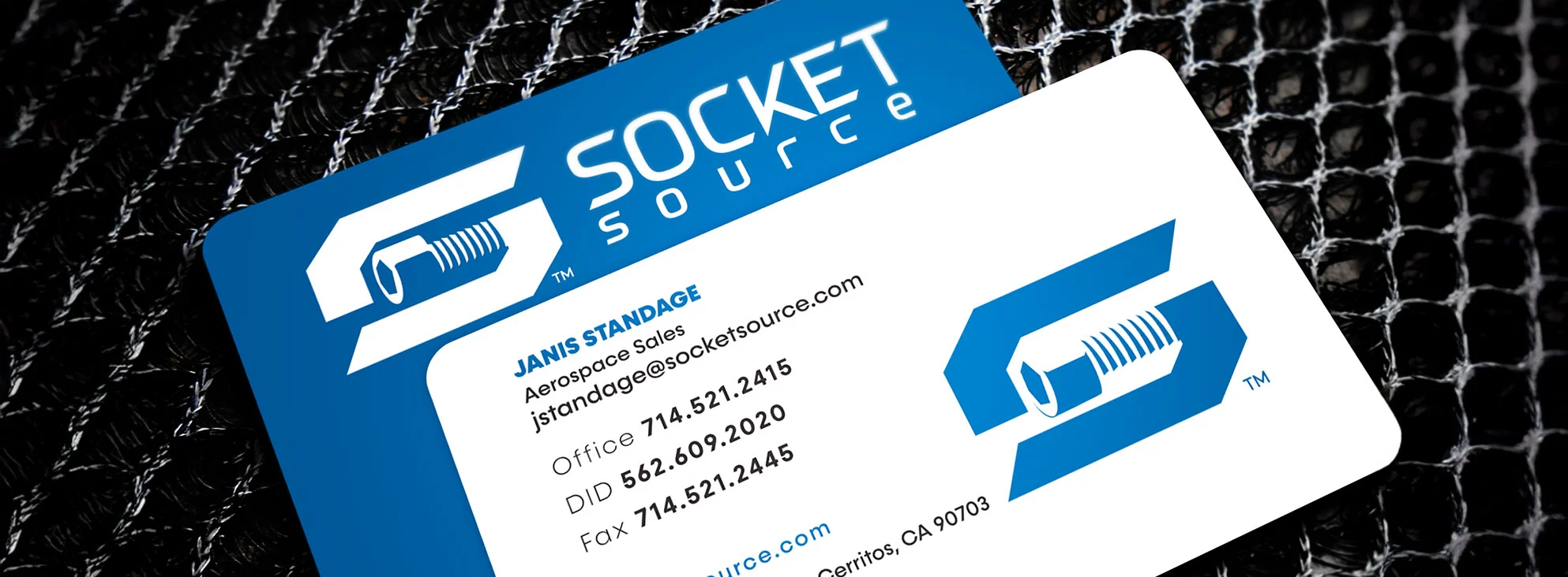 Socket-source-logo-on-card-by-dogs-of-design