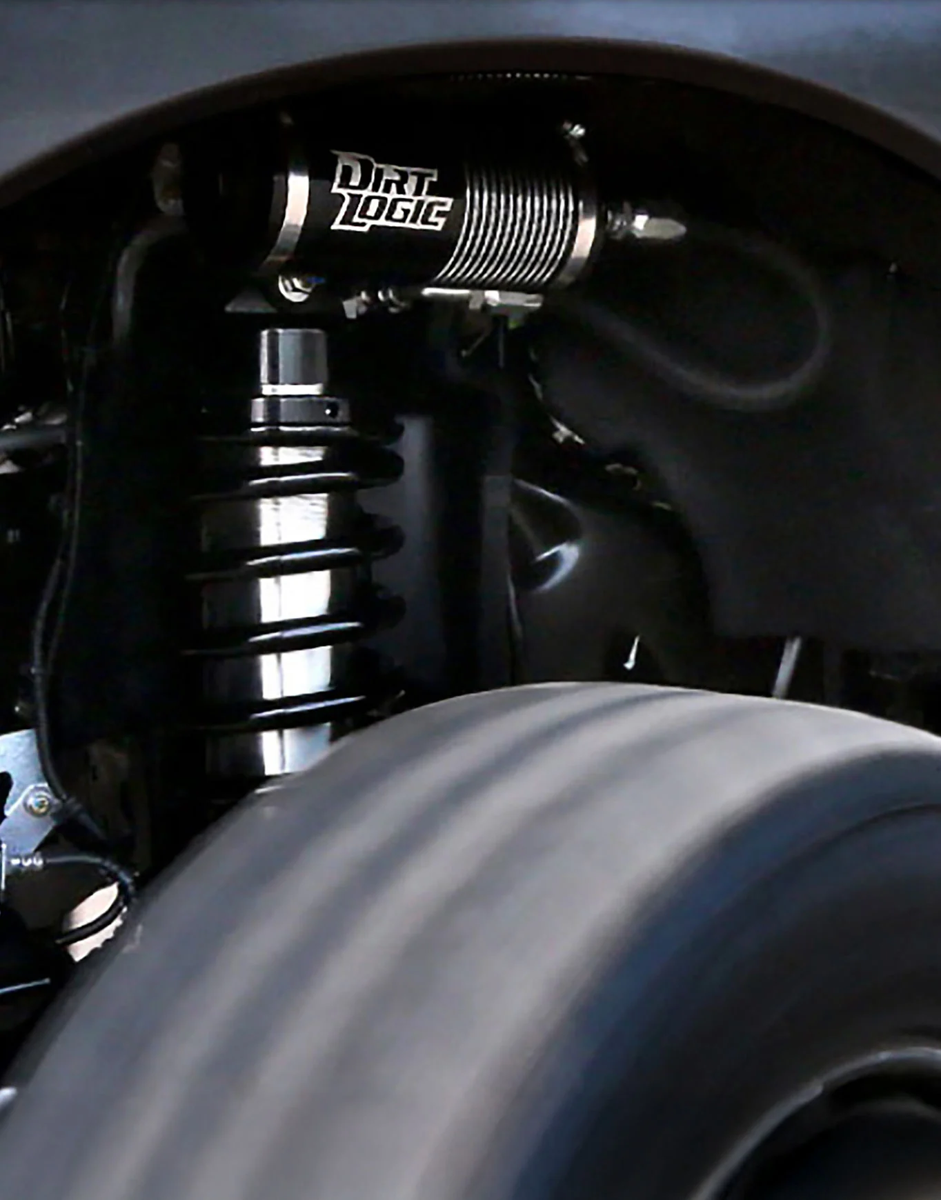 Fabtech Dirt Logic Shocks logo on truck design by Dogs of Design – high-performance off-road branding for suspension systems